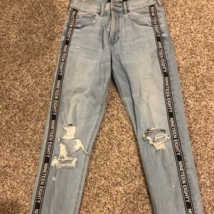Express straight jeans with rips and writing